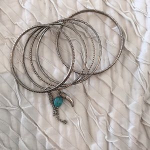 Five silver bracelets